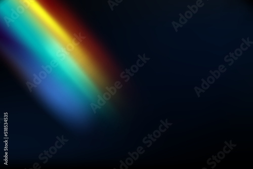 Rainbow highlights on a black background.Glare or reflection from water and glass.Glittering particles for social media backgrounds, product presentations, photo shots.