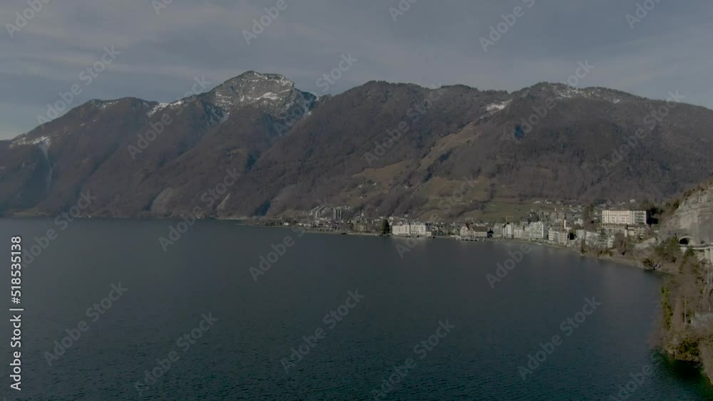 Drone shot over swiss mountain lake in breathtaking mountain landscape Drone shot over swiss mountain lake in breathtaking mountain landscape