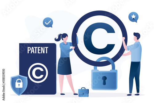 Intellectual property, concept. Trademark license, patent. Authors, co-founders hangs padlock on copyright sign. Copyright protection, prohibition of copying and use of trademark. photo