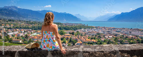 woman looking at Montreux city view and Leman lake- Switzerland © M.studio