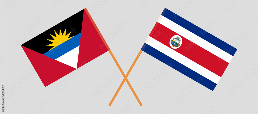 Crossed flags of Antigua and Barbuda and Costa Rica. Official colors. Correct proportion
