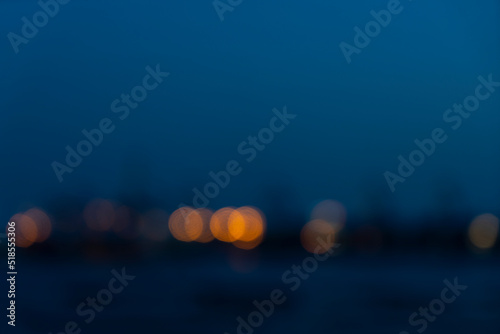 Wallpaper Mural Blurred of industry background with defocused cargo dock terminal in sea with colorful bokeh lights at midnight. Urban and industry backdrop Torontodigital.ca