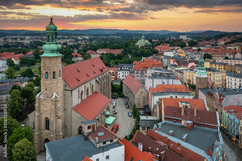 Fototapeta premium Beautiful architecture of the Town Hall Square in Jelenia Gora at sunset, Poland