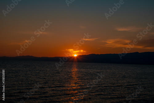 sunset over the sea © varol