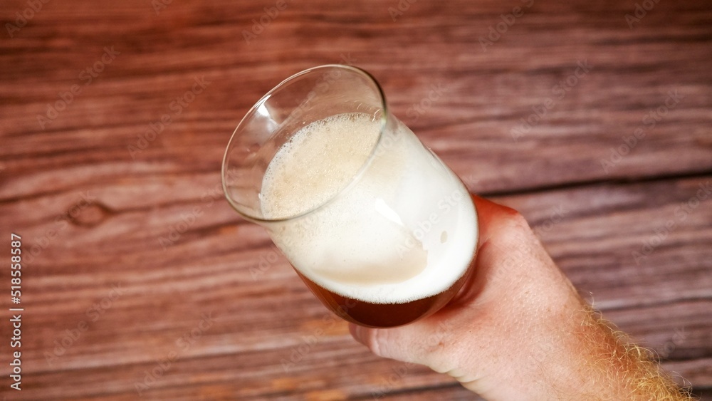 Fresh draft beer kept in a glass Fresh draft beer kept in a glass