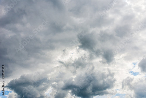 Dramatic stormy sky clouds background.Beautiful against the rain sky with white cloud background wallpaper.