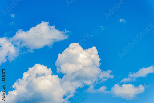 White fluffy clouds in the blue sky summer background.Cloudy white blue sky in the nice blue heaven sky.