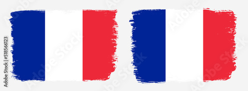 A set of two vector brush flags of France with abstract shape brush stroke effect