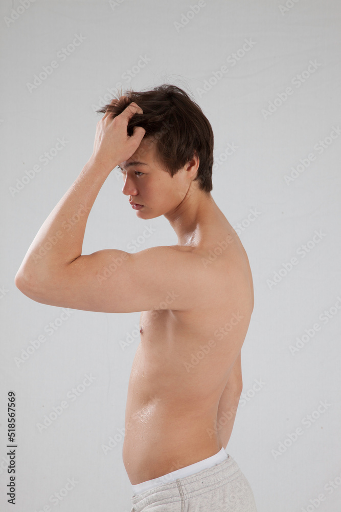 Obraz premium Young man with his shirt off