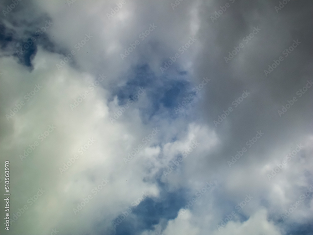 photo of clouds in the blue sky in summer