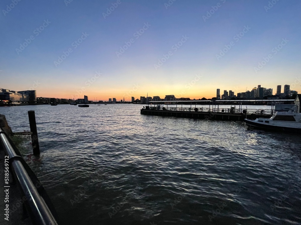 Sunset over the Thames and London from Greenwich Pier