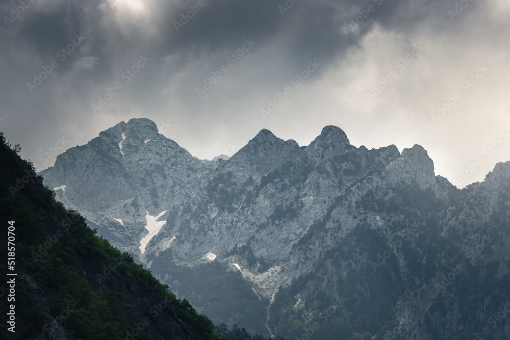 epic mountain vista with dramatic storm light