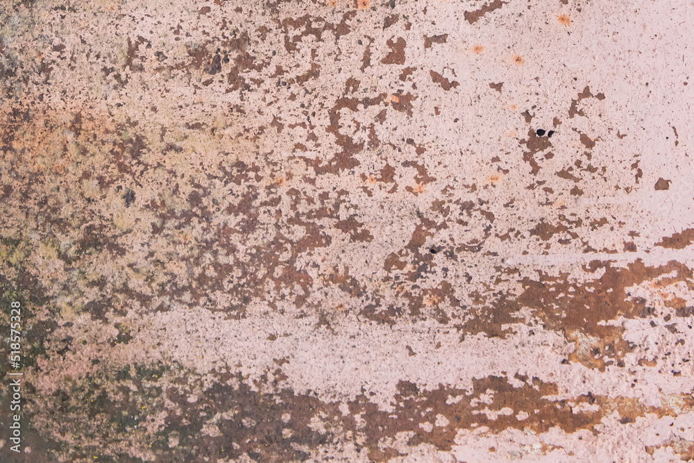 Light pink paint peeling off from the surface of the old metallic texture grunge steel background obsolete messy
