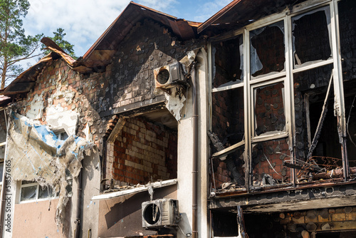 House in of civilians destroyed by russian soldiers. Atrocities of the russian army in the suburbs of Kyiv (Irpin). russia's war against Ukraine.