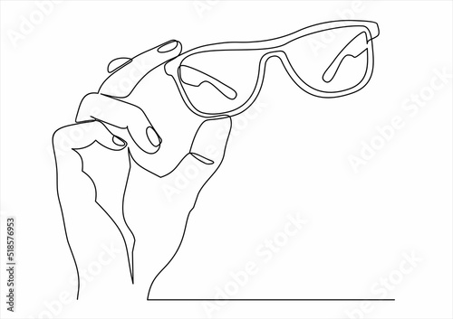continuous one line vector drawing of hand holding sunglasses. Line art. 