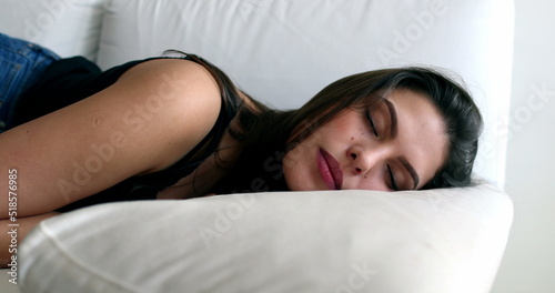 Fotografi Millennial girl in couch dozing off falling asleep