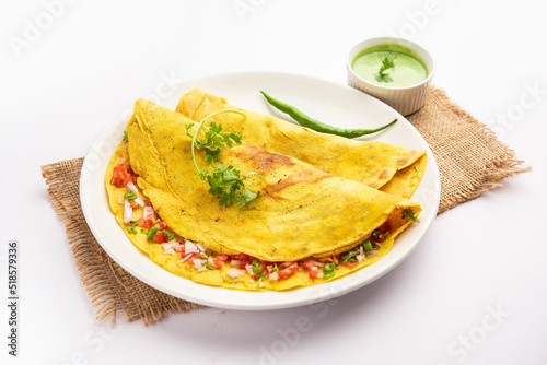 cheela, Chilla or Chila is a Rajasthani breakfast dish generally made with gram flour or besan photo