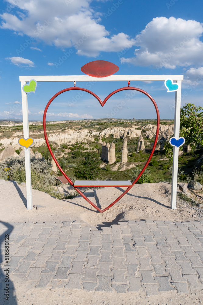 Panorama of the Valley of Love in Cappadocia, with the typical swings where people take photos. Panorama of the Valley of Love in Cappadocia, with the typical swings where people take photos.