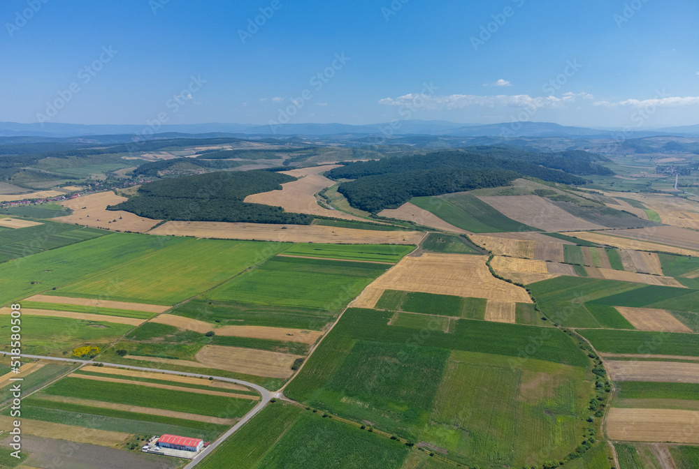 aerial landscape of an agricultural farm in the field