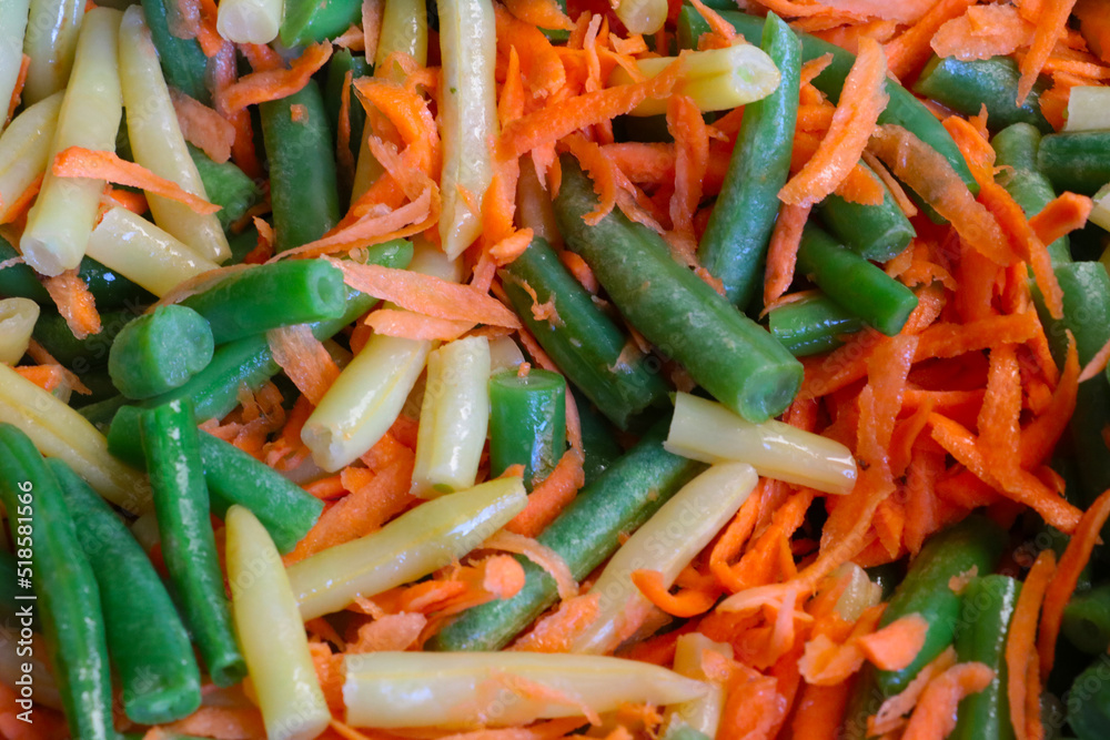 Asparagus beans with carrots cooked in a pan. Asparagus beans with carrots cooked in a pan.