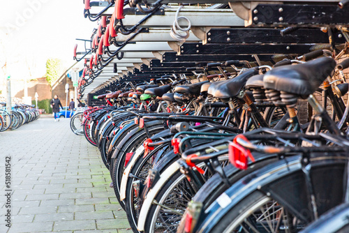 amsterdam and bicycles parked on the roadside © Brother's Art