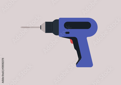 An isolated electric screwdriver, a hand drill, a workshop concept