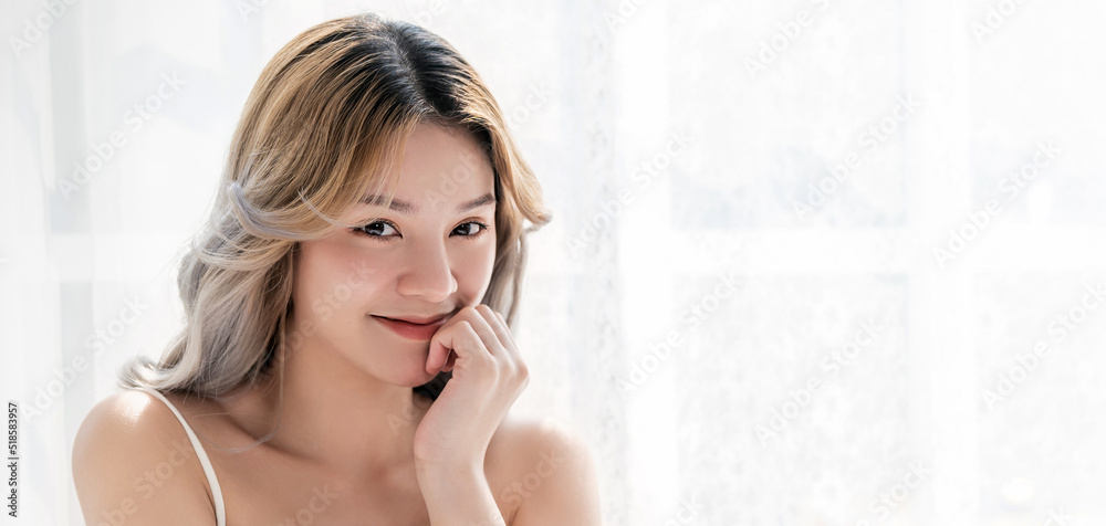 Closeup portrait of beauty asian woman with fair perfect healthy glow with copy space, young beautiful asia girl with pretty smile face. Beauty korean women spa skincare banner Closeup portrait of beauty asian woman with fair perfect healthy glow with copy space, young beautiful asia girl with pretty smile face. Beauty korean women spa skincare banner