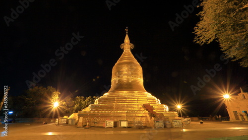 Golden pagoda at night in Myanmar.