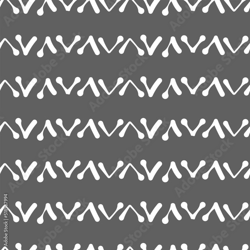 Vector.  Abstract monochrome ethnic seamless pattern. Artistic background hand drawn simple shapes of angle brackets  checkmarks. Mosaic abstract background. Repeating geometric texture. Dividers.