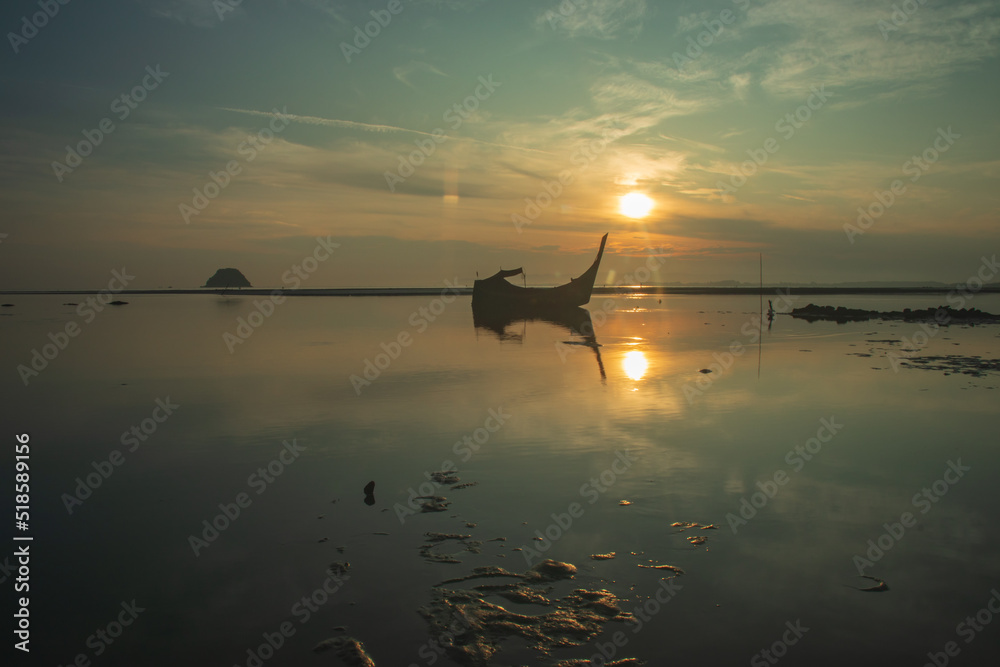 Fishing boat with sunrise background Fishing boat with sunrise background