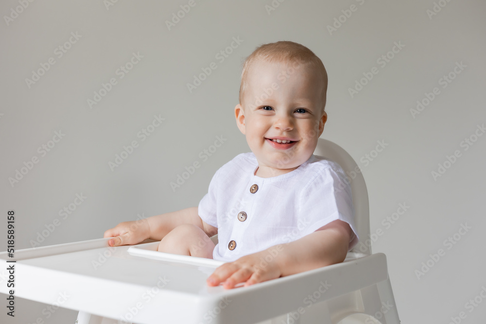 cheerful little boy in high chair, health, space for text, banner, card cheerful little boy in high chair, health, space for text, banner, card