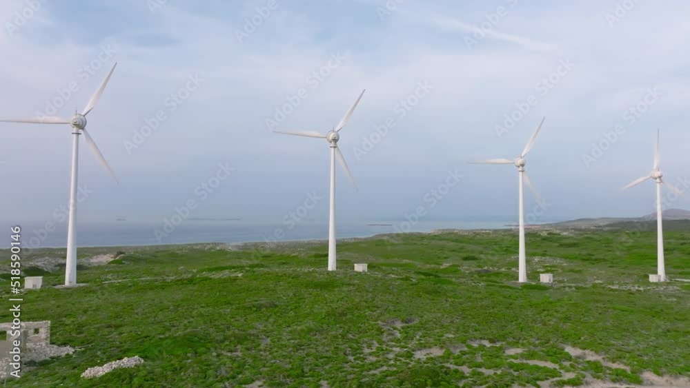 Wind turbines of alternative energy on the seashore Wind turbines of alternative energy on the seashore