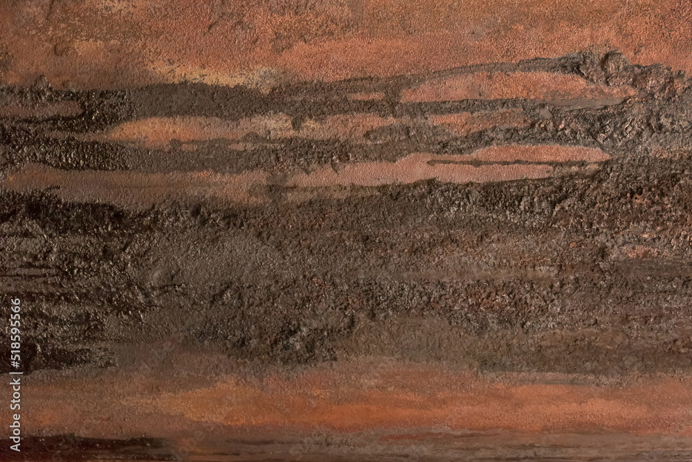Brown rusty metal surface with dark traces of fuel oil old steel texture industrial background