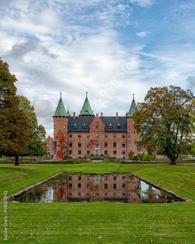 Trolleholm castle in the Eslov region of Southern Sweden reflected in the water photo