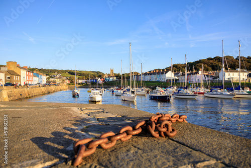 Evening view at Aberaeron Harbour, Wales, during a high tide with moored boats photo
