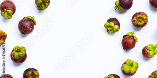 Frame made of mangosteen on white background. Top view