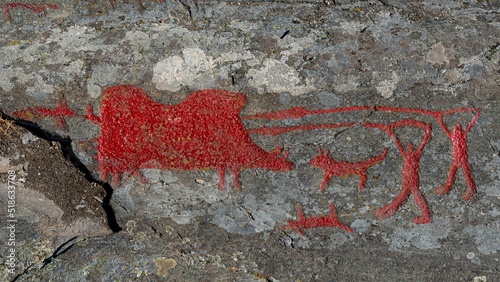 Closeup shot of a rock carving of the hunt, in Himmelstalund, Norrkoping, Sweden photo