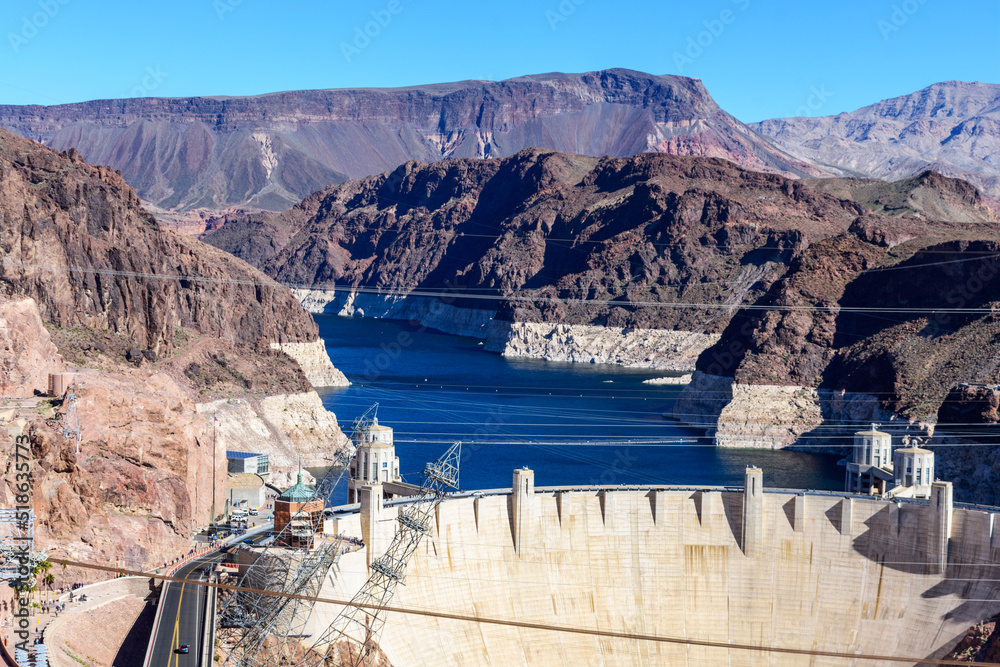 Aerial view of Hoover Dam and low water level Lake Mead on Colorado
