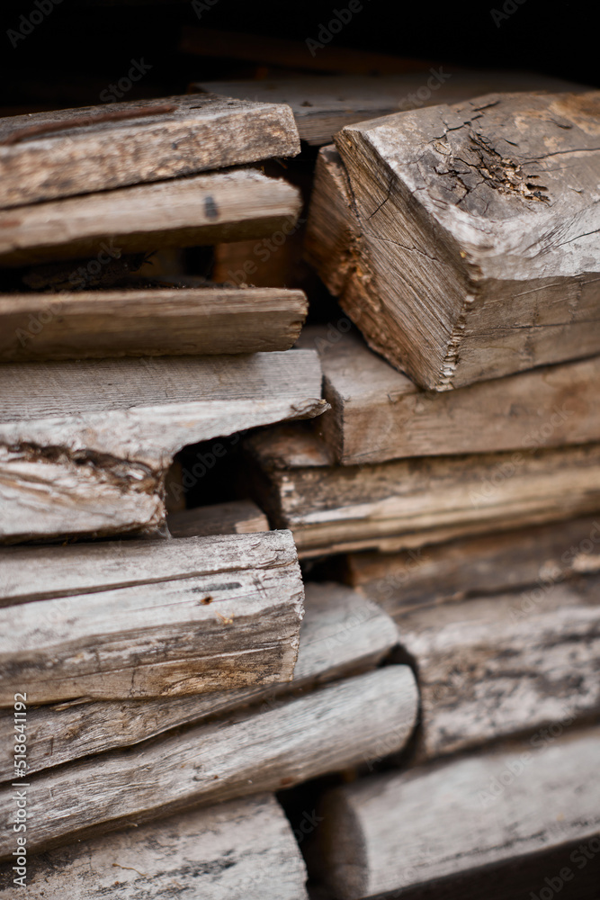 Chopped dry firewood outside, in a barn. Chopped dry firewood outside, in a barn.