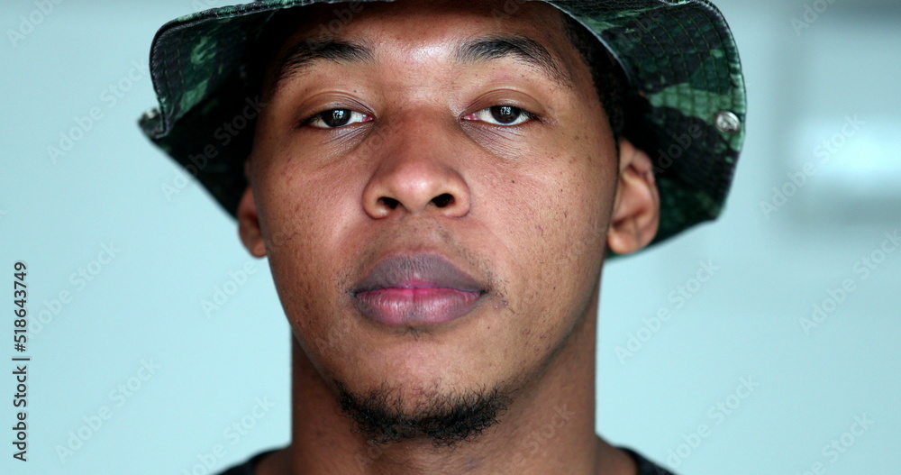 Portrait millennial black man face close-up Portrait millennial black man face close-up