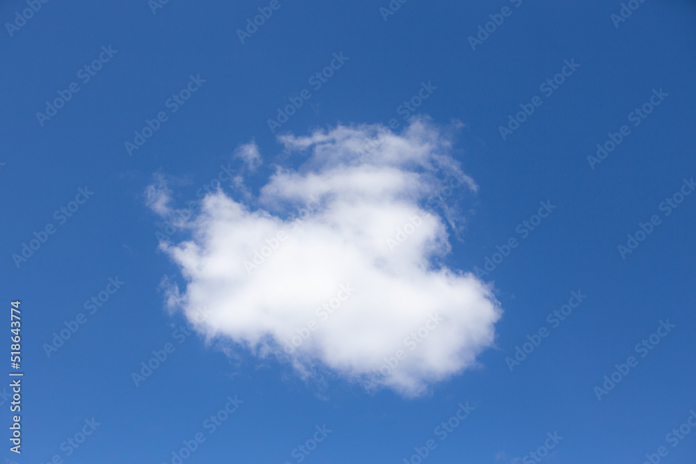 White cloud with cotton texture isolated on blue sky background White cloud with cotton texture isolated on blue sky background