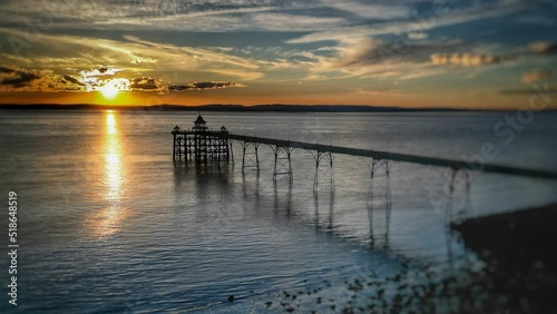 Beautiful shot of the Clevedon Pier under a sunset sky photo