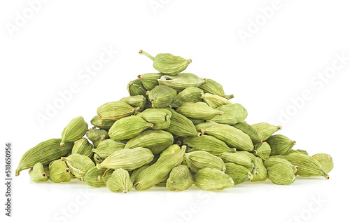 Pile of dried cardamom pods isolated on a white background. Cardamom seeds.