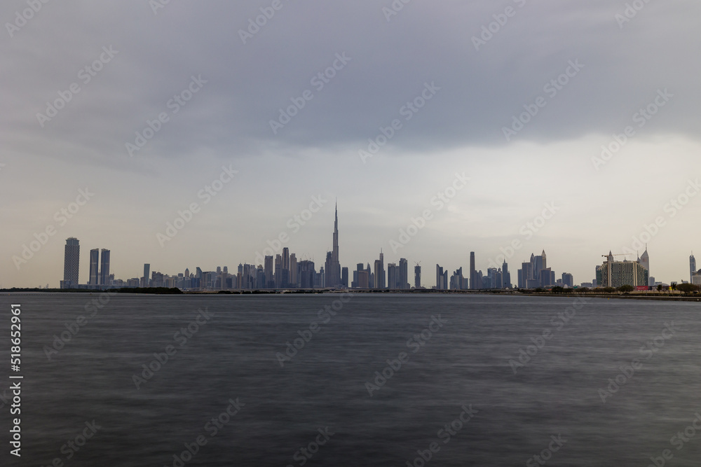 Dubai on a rainy or cloudy day. Dramatic shot of Dubai Skyline or Skyscrapers or Buildings