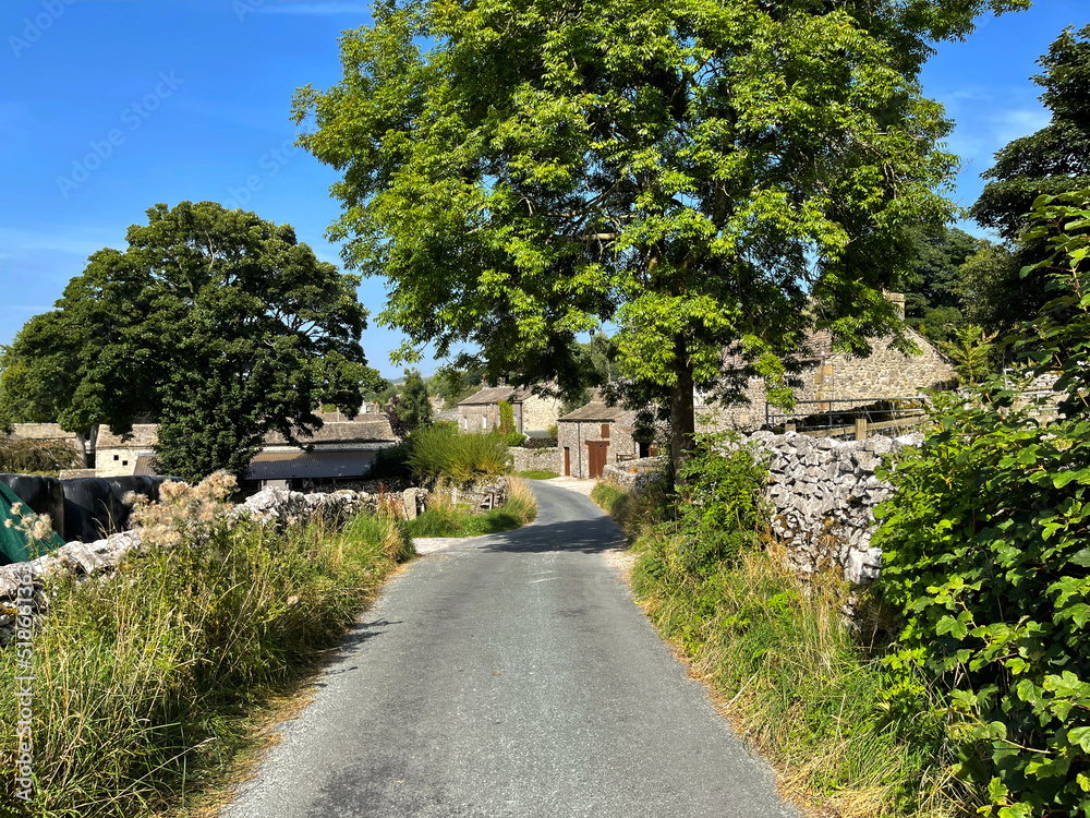 Country road, leading into the Yorkshire Dales village of, Conistone, Skipton, UK