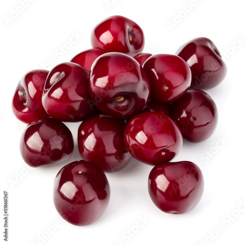 Sweet cherries pile isolated on white background