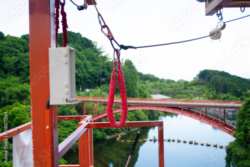 Fotobehang Bungie Jump cable hardware on platform above river