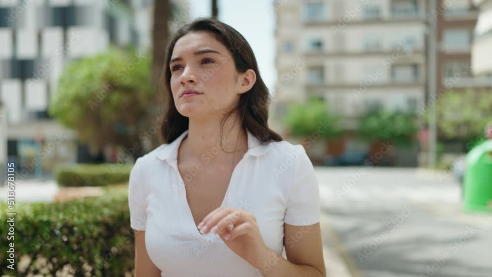Young hispanic woman smiling confident walking at street Young hispanic woman smiling confident walking at street