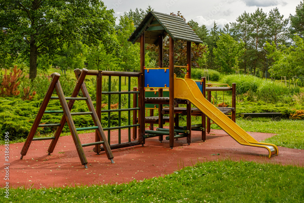 Kids playground with multifunctional elements made from wood located in city or town Kids playground with multifunctional elements made from wood located in city or town