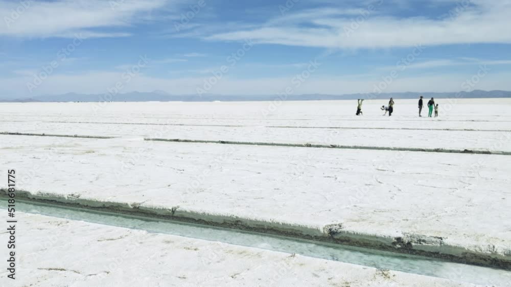 Tourists in Salinas Grandes Salt Flats, Jujuy Province, North West of Argentina, South America. Tourists in Salinas Grandes Salt Flats, Jujuy Province, North West of Argentina, South America.